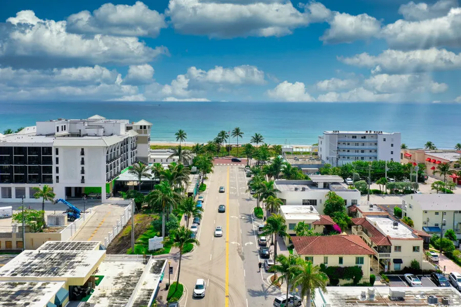 Florida coastal construction site with palm trees
